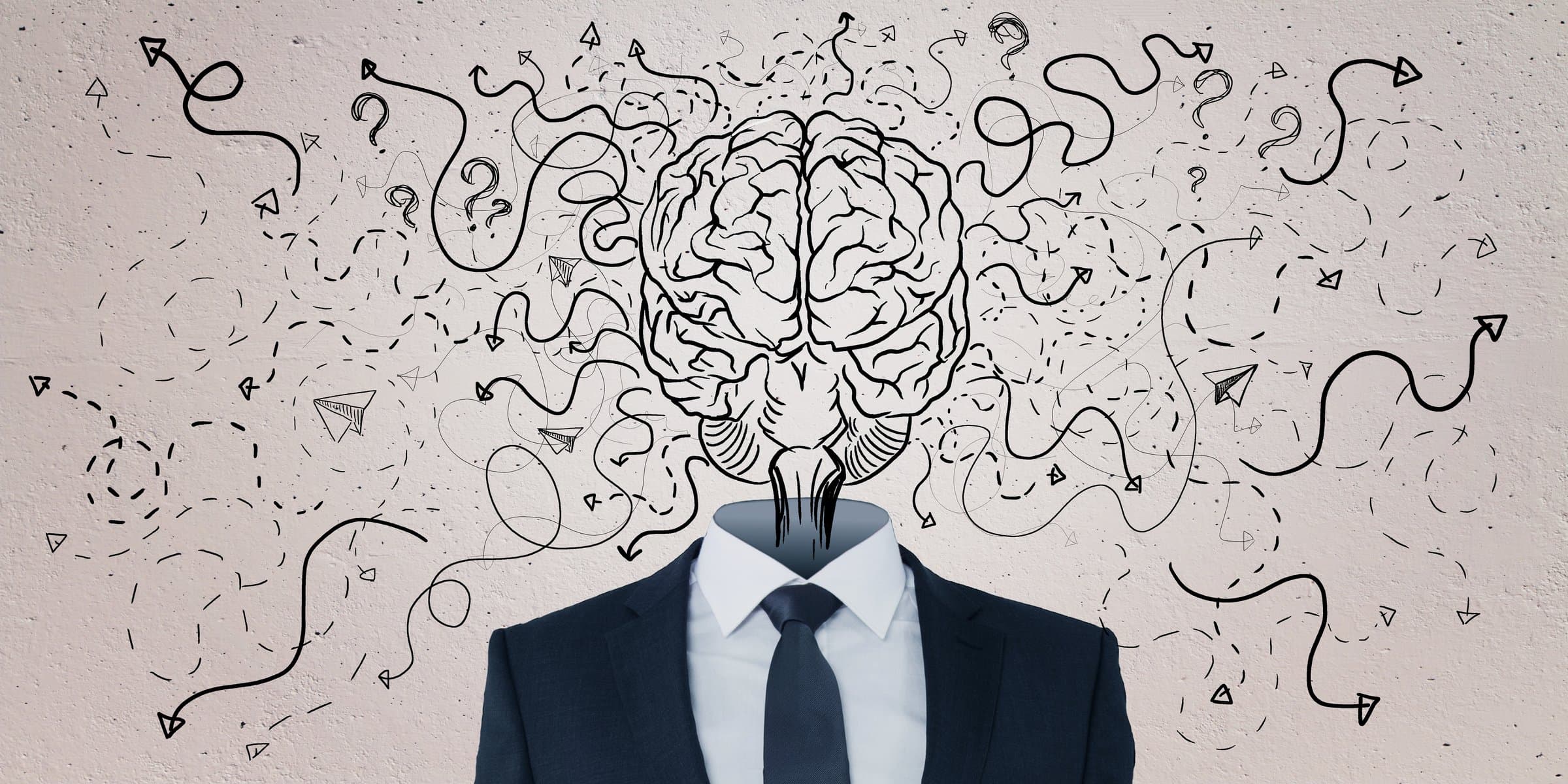 Sketch of a brain above a business suit, surrounded by tangled arrows and question marks